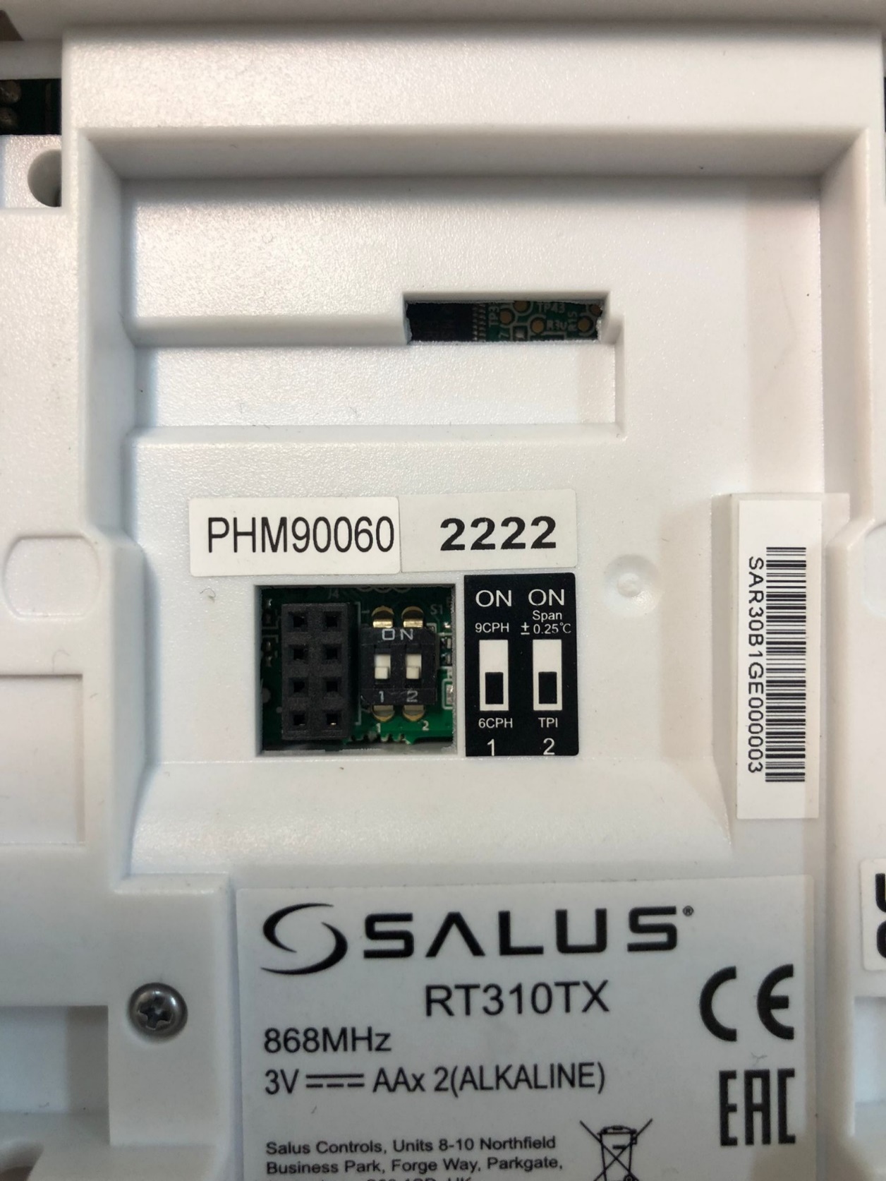 The back of a white deviceDescription automatically generated